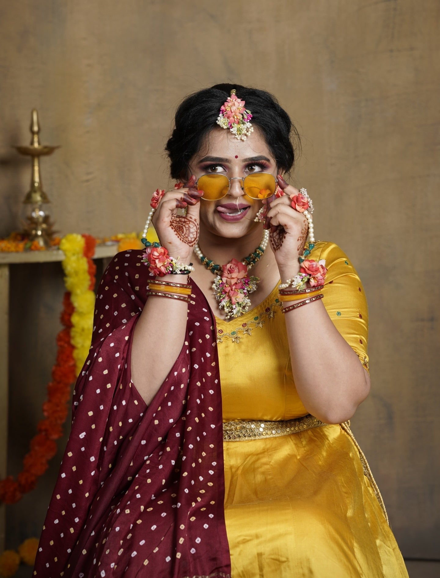 Yellow Lehnga Choli with Silk Bandhani Maroon Duppatta